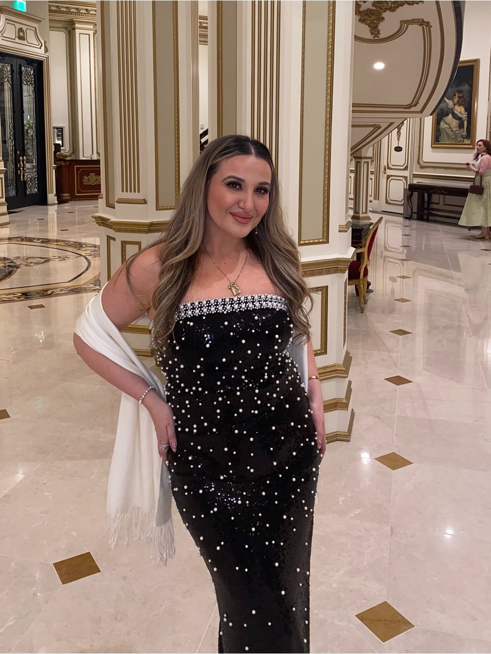 Elegant Black Strapless Evening Gown with Pearl Embellishments